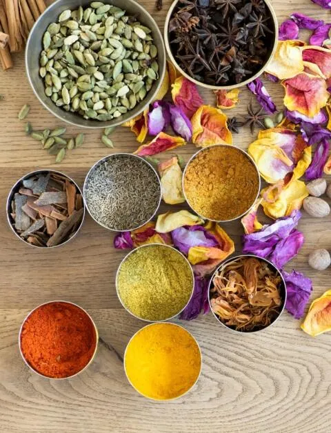 Bowls of Ayurvedic spices and herbs